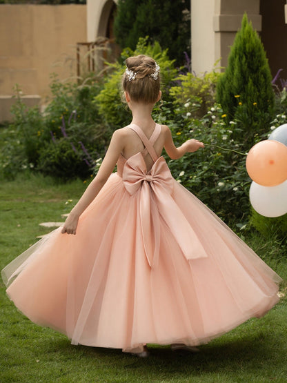 The bodice is crafted from delicate matte satin, while the skirt consists of multiple layers of soft tulle. It features great draping, light volume and no bulky feel.