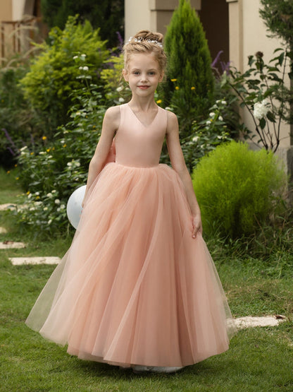 The bodice is crafted from delicate matte satin, while the skirt consists of multiple layers of soft tulle. It features great draping, light volume and no bulky feel.