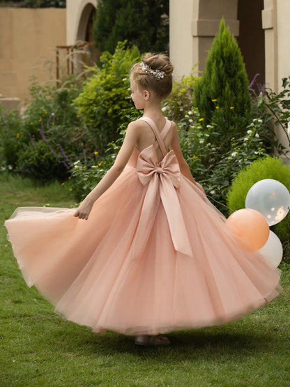 The bodice is crafted from delicate matte satin, while the skirt consists of multiple layers of soft tulle. It features great draping, light volume and no bulky feel.