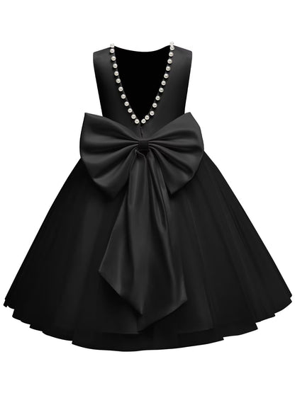 The bodice is crafted from fine matte satin, and the skirt is made of multiple layers of soft tulle. It features great draping, light and full without being bulky.