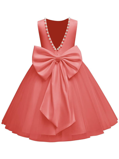 The bodice is crafted from fine matte satin, and the skirt is made of multiple layers of soft tulle. It features great draping, light and full without being bulky.