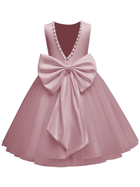 The bodice is crafted from fine matte satin, and the skirt is made of multiple layers of soft tulle. It features great draping, light and full without being bulky.