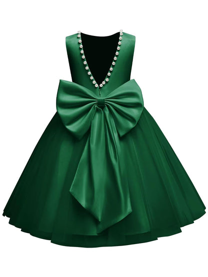 The bodice is crafted from fine matte satin, and the skirt is made of multiple layers of soft tulle. It features great draping, light and full without being bulky.