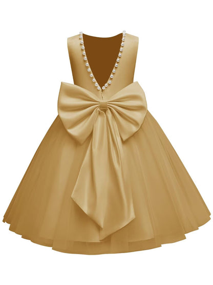 The bodice is crafted from fine matte satin, and the skirt is made of multiple layers of soft tulle. It features great draping, light and full without being bulky.
