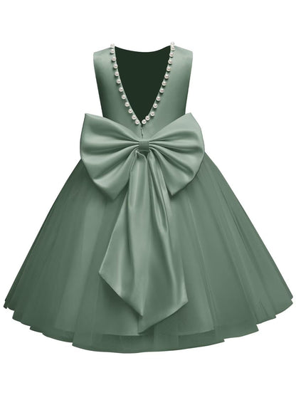 The bodice is crafted from fine matte satin, and the skirt is made of multiple layers of soft tulle. It features great draping, light and full without being bulky.