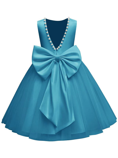 The bodice is crafted from fine matte satin, and the skirt is made of multiple layers of soft tulle. It features great draping, light and full without being bulky.