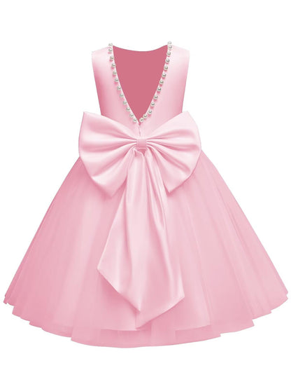 The bodice is crafted from fine matte satin, and the skirt is made of multiple layers of soft tulle. It features great draping, light and full without being bulky.