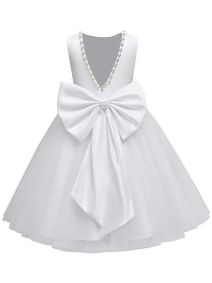 The bodice is crafted from fine matte satin, and the skirt is made of multiple layers of soft tulle. It features great draping, light and full without being bulky.